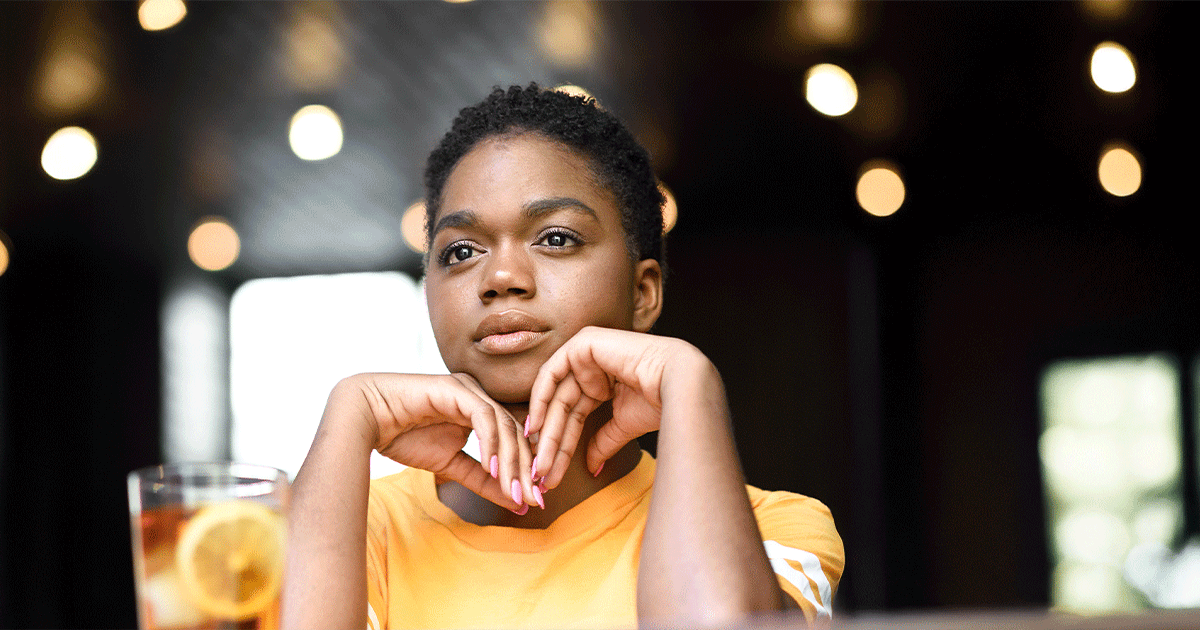 Woman considering the differences between medical and surgical abortion procedures.
